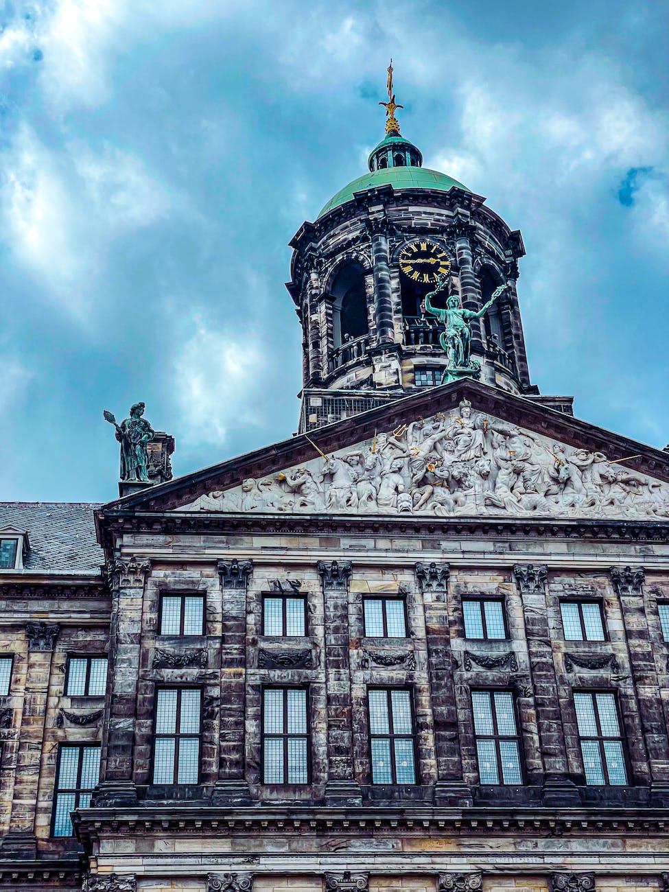 royal palace at the dam square in amsterdam